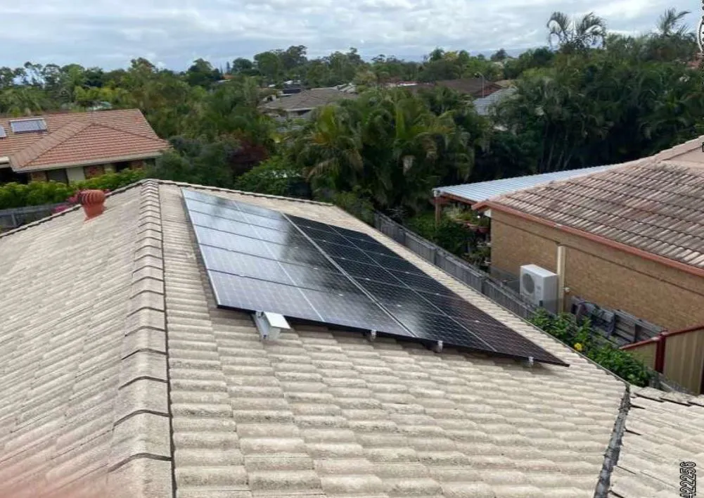 Residential House with Solar Panels Installed on the Roof